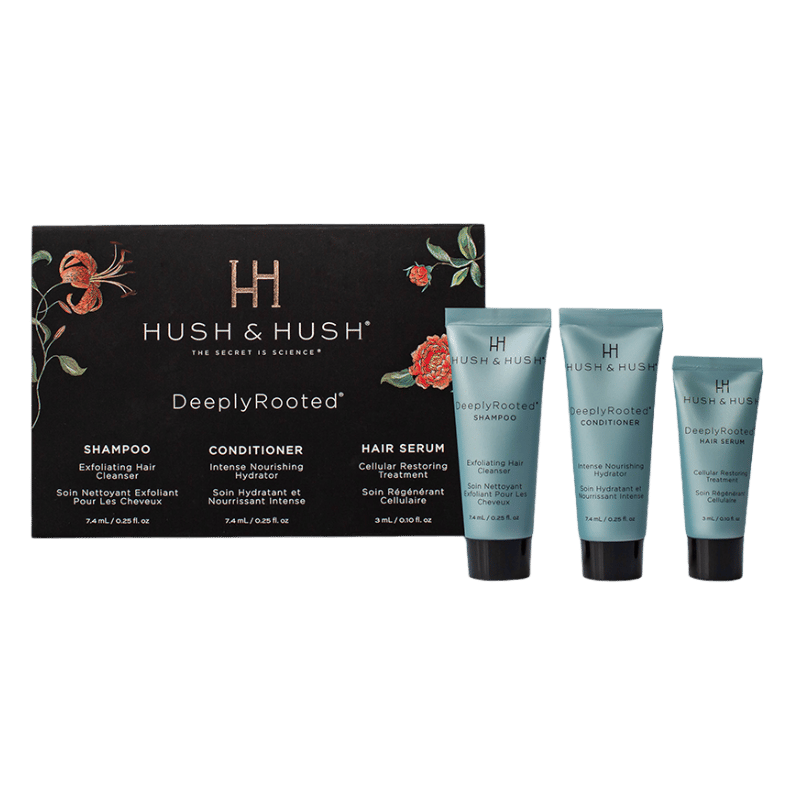 Hush & Hush DeeplyRooted Trial Set: Shampoo, Conditioner und Haarserum in blauen Tuben vor schwarzer Verpackung.