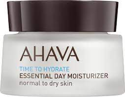 AHAVA Time to Hydrate Essential Day Moisturizer für normale bis trockene Haut in einem weißen Tiegel mit braunem Deckel.