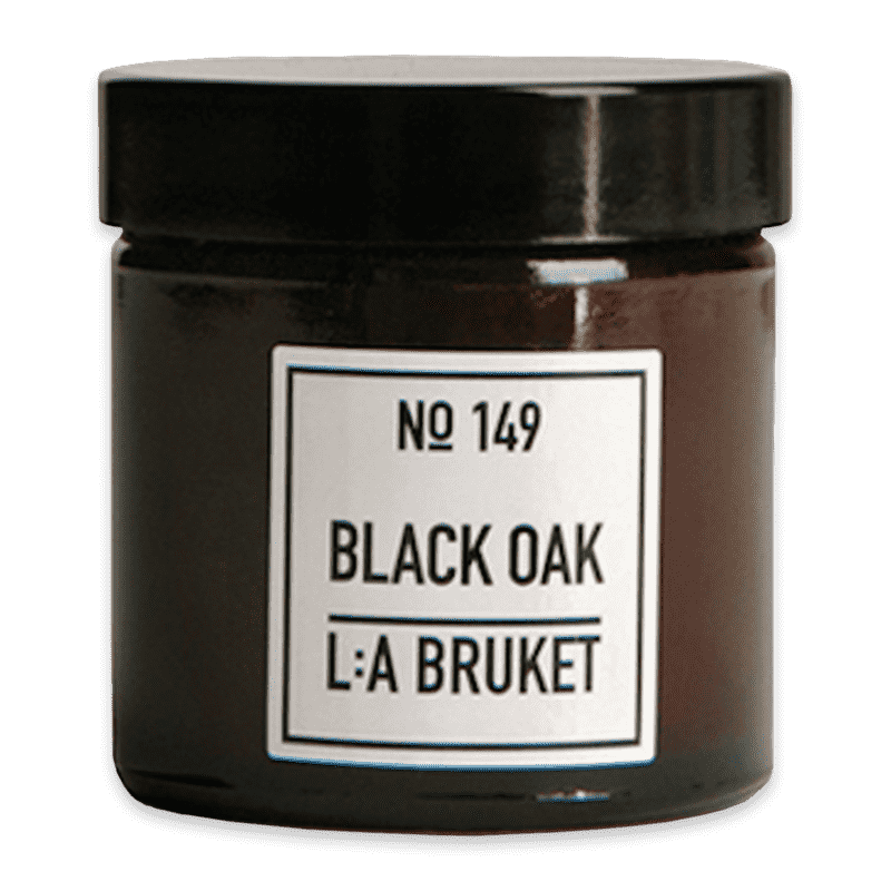 Braunes Glasgefäß mit schwarzem Deckel, beschriftet mit 'No 149 BLACK OAK L:A BRUKET'.