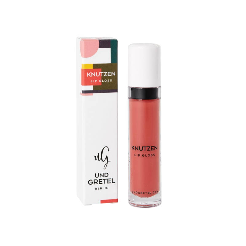 UND GRETEL KNUTZEN Lip Gloss 01 Matte Apricot, Verpackung und Flasche, auf weißem Hintergrund.