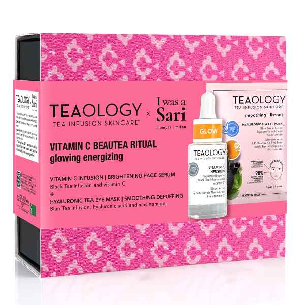 Teebox mit Vitamin C Beauty Ritual Set, bestehend aus Serum und Maske, auf rosa Hintergrund.