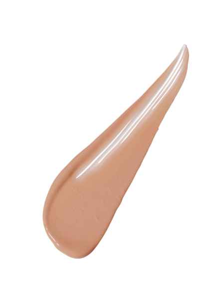 Nahaufnahme eines beigen Make-up-Flecks auf weißem Hintergrund.